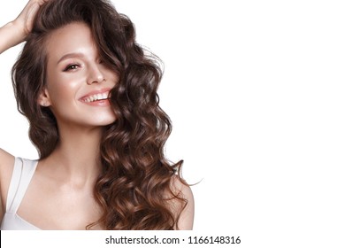 Beautiful Young Girl In White Dress With Natural Make-up, Hair Curls And Smile. Beauty Face.