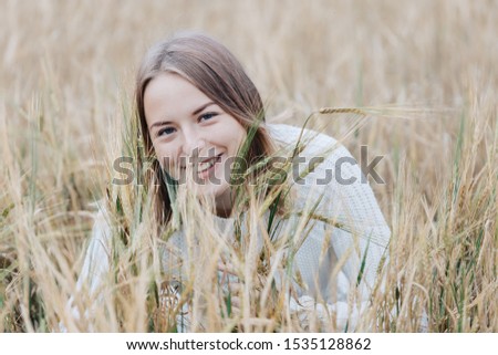 Similar – Image, Stock Photo laughing, blonde woman, sunset, field