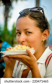 Beautiful Young Happy Girl Eating A Tostada Soft Taco Pupusas In Guatemala