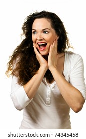 A Beautiful Young Happy Woman Looking Pleasantly Surprised