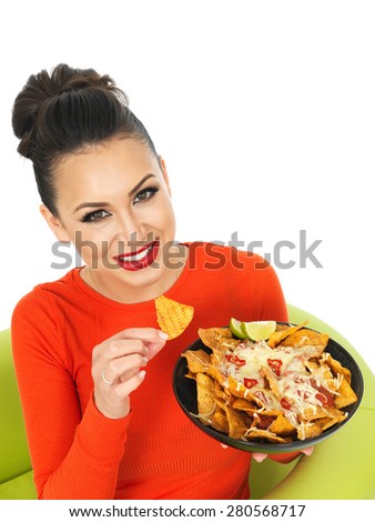 Beautiful Young Hispanic Woman With a Plate of Cheesy Nachos and Spicy Salsa Sauce Against A White Background