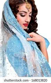 Beautiful Young Indian Woman In Traditional Clothing With Bridal Makeup And Jewelry. 