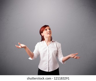 Beautiful Young Lady Standing And Juggling With Copy Space