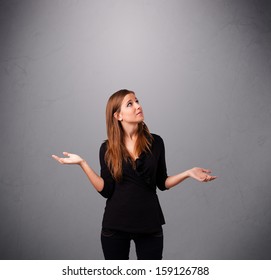beautiful young lady standing and juggling with copy space