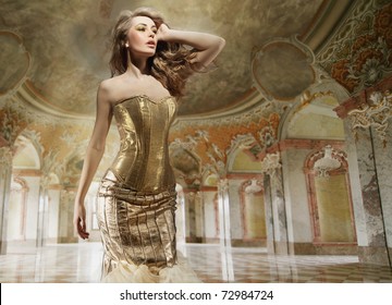 Beautiful young lady standing in a stylish interior