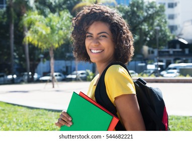 Beautiful Young Latin Female Student Walking To University