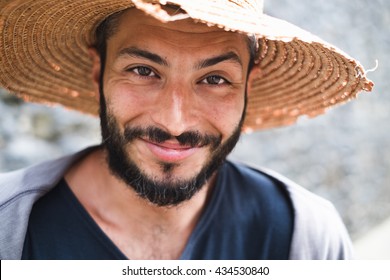 Beautiful Young Man With A Straw Hat