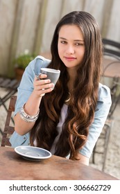 Beautiful Young Maori Woman Drinking Coffee