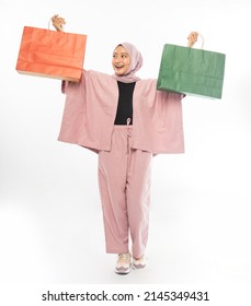 Beautiful Young Muslim Woman Happy Holding A Shopping Bag