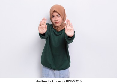 Beautiful Young Muslim Woman With Open Hand Doing Stop Sign With Serious Expression Defense Gesture Isolated On White Background
