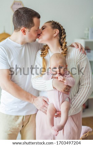 Similar – happy family playing at home on the bed