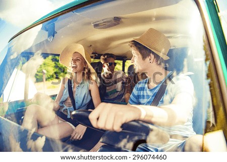 Similar – Two young women resting sitting inside of car