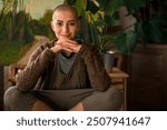 Beautiful young positive female cancer survivor smiling indoors portrait. Mental health, life balance, mindfulness and mindreset concept. 