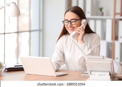 Beautiful Young Secretary Working In Office