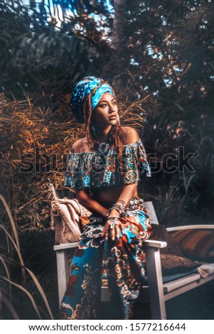 beautiful young stylish woman on tropical background. double exposure concept
