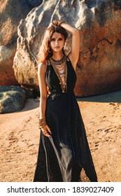 Beautiful Young Stylish Woman At Sunset At The Beach