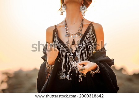beautiful young stylish woman at sunset close up portrait