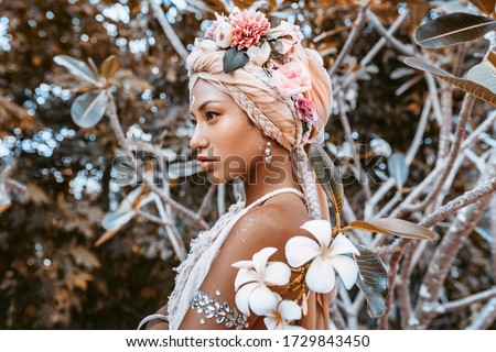 beautiful young stylish woman wearing flowers wreath outdoors portrait