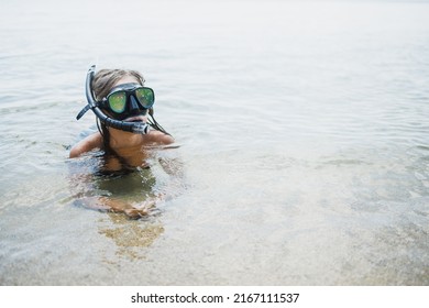 Beautiful Young Teen Girl With Scuba Mask Enjoying In The Sea.