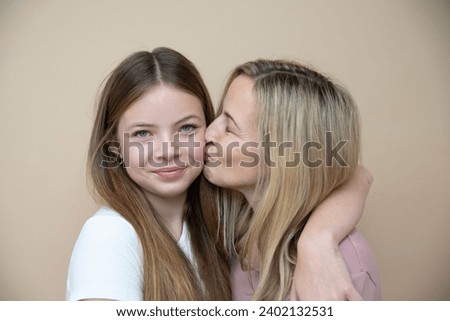 Similar – Granddaughter hugging her grandmother