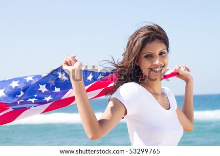 beautiful young woman with american flag