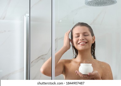 Beautiful Young Woman Applying Hair Mask In Shower At Home. Space For Text