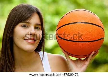 Similar – Image, Stock Photo Young female basketball player in an urban court