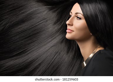 Beautiful Young Woman With Black Shiny Hair