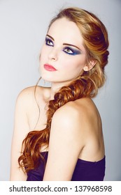 Beautiful Young Woman With Blond Red Hair In Fishtail Braid And Dramatic Eye Makeup 