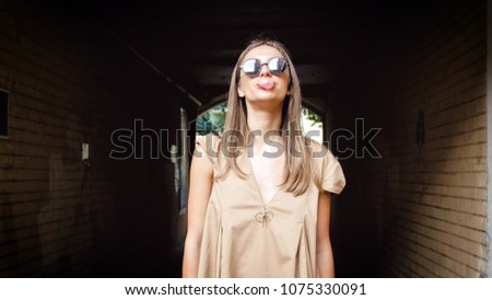 Similar – Happy thin woman with sunglasses and hat smiling while visiting The Rocks in Sydney city, Australia.