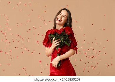 Beautiful young woman with bouquet of red roses and confetti on brown background. Valentine's Day celebration