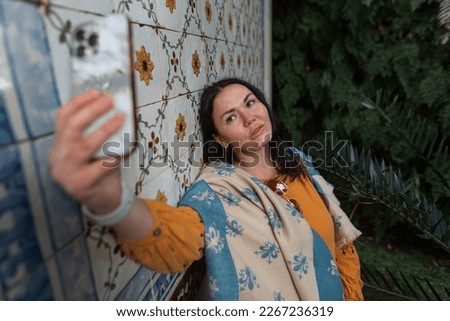 Similar – Image, Stock Photo funny twin sisters make a selfie with the smartphone