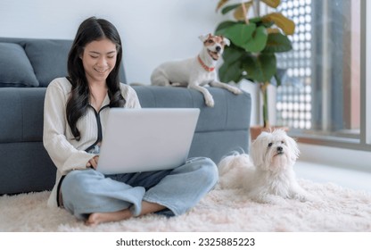 Beautiful young woman browsing internet at home, Businesswoman working remotely from home, Online shopping, Online learning. - Powered by Shutterstock