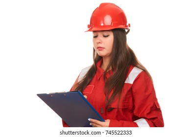 Beautiful young woman civil engineer in protective uniform and helmet with paper clipboard isolated on white background with copy space,close up portrait. Safety concept