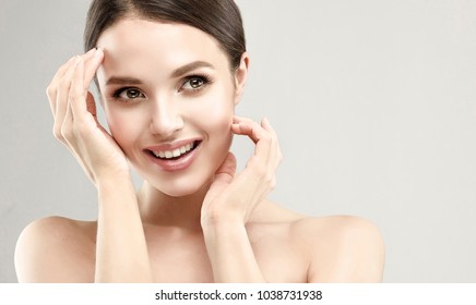 Beautiful Young Woman With Clean Fresh Skin  .Girl  Beauty Face Care. Facial  Treatment   .