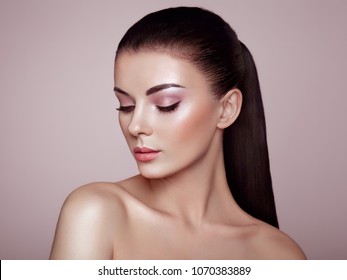 Beautiful Young Woman With Clean Fresh Skin. Perfect Makeup. Beauty Fashion. Eyelashes. Cosmetic Eyeshadow. Highlighting. Cosmetology, Beauty And Spa