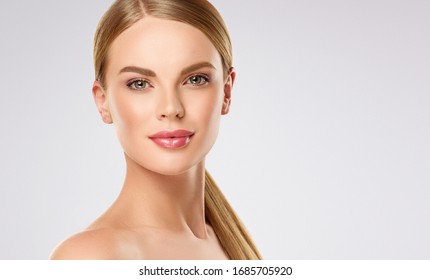 Beautiful Young Woman With Clean Fresh Skin On Face . Girl Facial  Treatment   . Cosmetology , Beauty  And Spa .