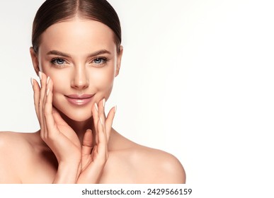 Beautiful young woman with clean fresh skin on face . Girl facial  treatment   . Cosmetology , beauty  and spa .
 - Powered by Shutterstock