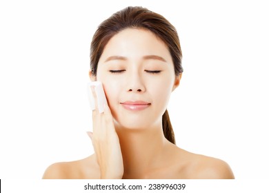 Beautiful  Young Woman Cleaning Her Face With Cotton