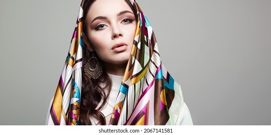 beautiful young woman in colorful veil. beauty girl. fashion ethnic style