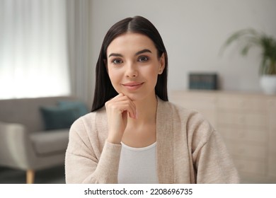 Beautiful Young Woman Conducting Webinar In Room, Camera View