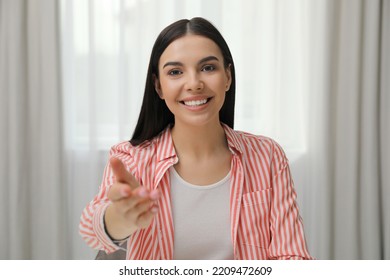 Beautiful Young Woman Conducting Webinar In Room, Camera View