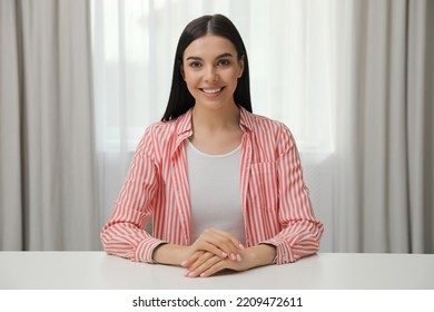 Beautiful Young Woman Conducting Webinar In Room, Camera View