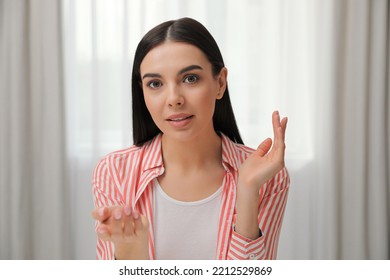 Beautiful Young Woman Conducting Webinar In Room, Camera View