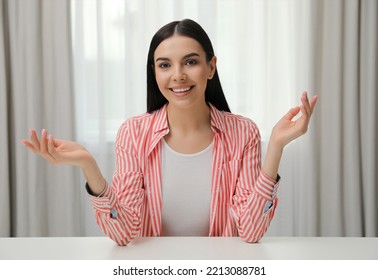 Beautiful Young Woman Conducting Webinar In Room, Camera View