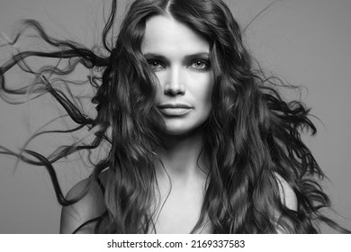 Beautiful Young Woman With Curly Healthy Hair. Beauty Hairy Girl, Black And White Portrait