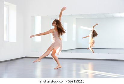 Beautiful Young Woman Dancing In Studio