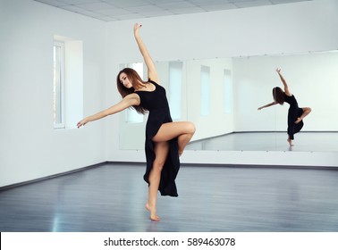 Beautiful Young Woman Dancing In Studio