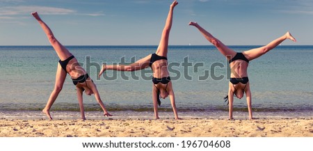 Beautiful young woman doing cartwheel on the beach with a calm sea in the background, composite of three images