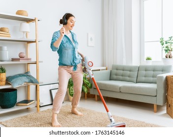 Beautiful young woman doing cleaning the house. - Shutterstock ID 1763145146